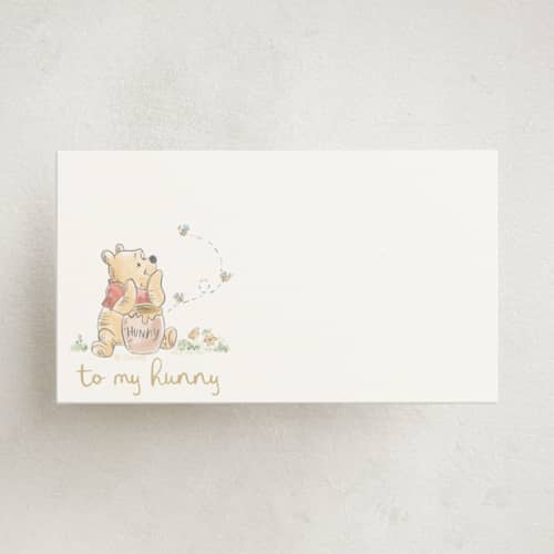 This is a honey small cards with standard by Creo Study called disney's winnie the pooh and a lil hunny printing on signature in 4.25x5.5