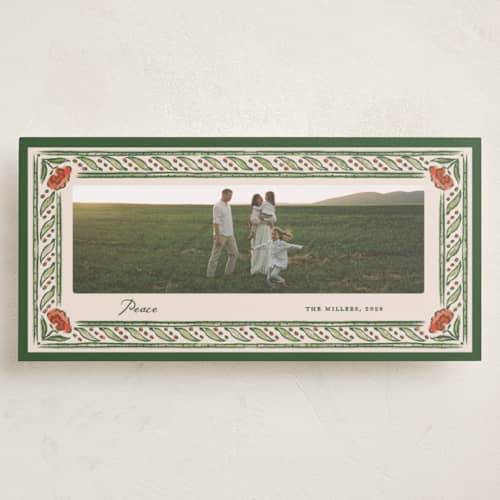 This is a garland holiday photo cards with standard by Pati Cascino called milo printing on recycled smooth signature in tall