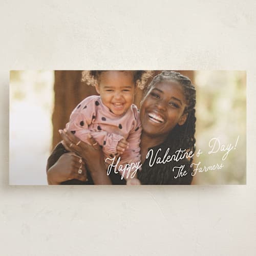 This is a cotton holiday photo cards with standard by Stacey Meacham called enchanting script printing on recycled smooth signature in tall