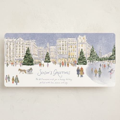 This is a powder holiday photo cards with standard by Jenna Holcomb called wintertime in the city printing on signature in tall