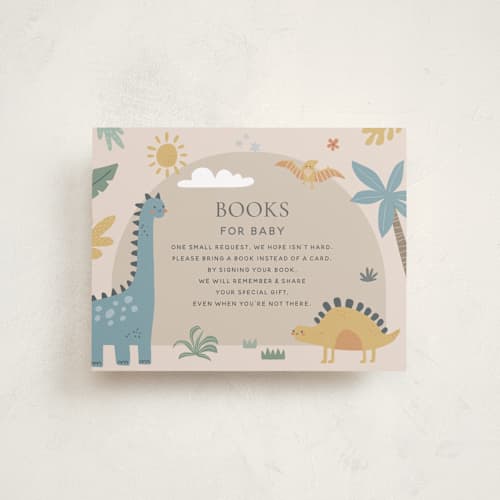 This is a tan baby shower insert cards with standard by Britt called baby dino printing on signature in standard