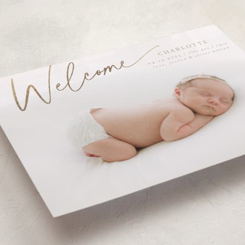 This is a almond foil stamped birth announcements with foil pressed by Deynaaz Daraei called dahlia printing on recycled smooth signature in standard