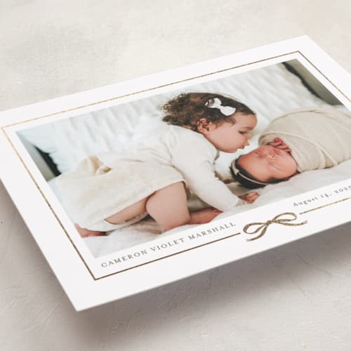 This is a cotton foil stamped birth announcements with foil pressed by Jessica Williams called ribbon wrap printing on recycled smooth signature in standard