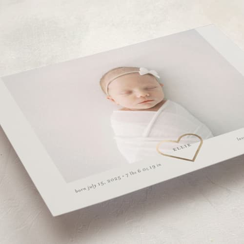 This is a cotton foil stamped birth announcements with foil pressed by Stephanie Heinrich Godbout called golden heart printing on recycled smooth signature in standard