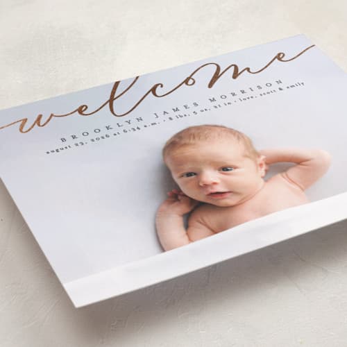 This is a charcoal foil stamped birth announcements with foil pressed by Erica Krystek called welcome ribbon printing on recycled smooth signature in standard