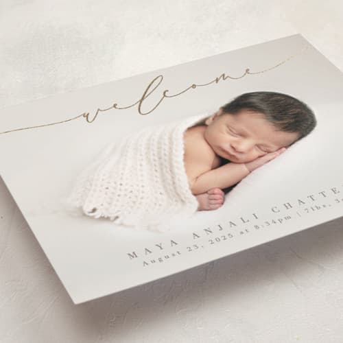 This is a fawn foil stamped birth announcements with foil pressed by Olivia Raufman called blissful welcome printing on recycled smooth signature in standard