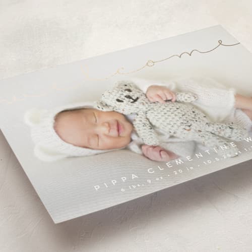 This is a cloud foil stamped birth announcements with foil pressed by Olivia Raufman called delicate welcome printing on recycled smooth signature in standard