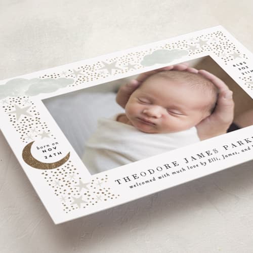 This is a mint foil stamped birth announcements with foil pressed by Alethea and Ruth called nighttime printing on recycled smooth signature in standard