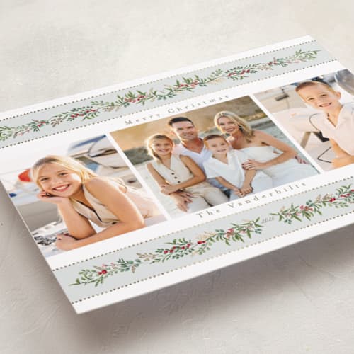 This is a holly berry foil pressed holiday cards with foil pressed by Susan Moyal called holiday ribbon printing on recycled smooth signature in standard