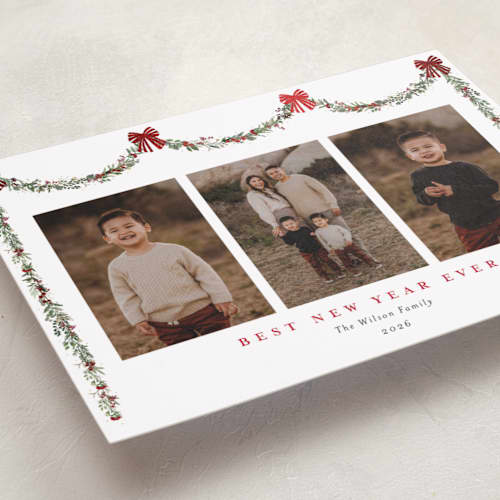 This is a peppermint foil pressed holiday cards with foil pressed by Susan Moyal called joyful holly printing on recycled smooth signature in standard