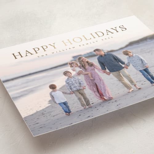 This is a vanilla foil pressed holiday cards with foil pressed by Christy Hy Lee called together printing on recycled smooth signature in standard