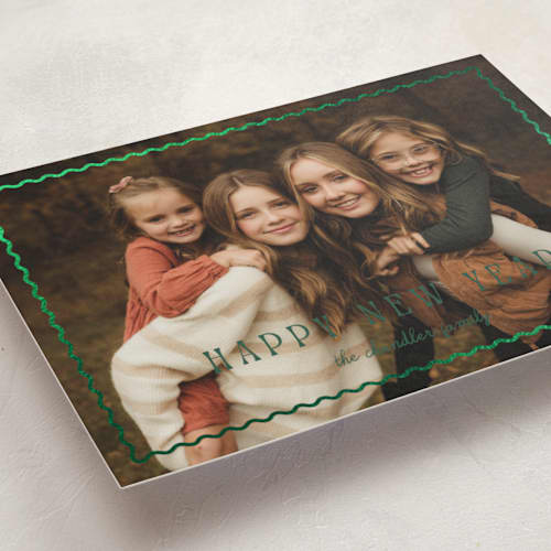 This is a pine foil pressed holiday cards with foil pressed by Pixel and Hank called wiggle printing on recycled smooth signature in standard