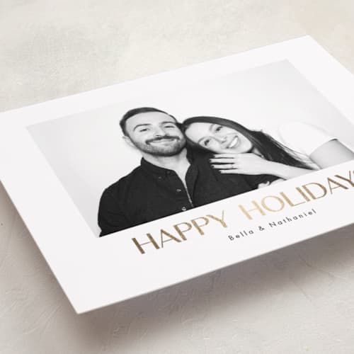 This is a snow foil pressed holiday cards with foil pressed by Kristen Knechtel called minimalist holiday printing on recycled smooth signature in standard
