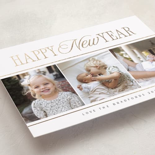 This is a snow foil pressed holiday cards with foil pressed by Nicole Walsh called new year trio printing on recycled smooth signature in standard
