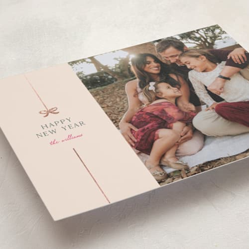 This is a gumdrop foil pressed holiday cards with foil pressed by Pixel and Hank called bow printing on recycled smooth signature in standard