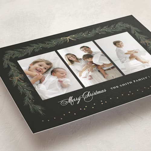 This is a midnight foil pressed holiday cards with foil pressed by Elly called ribbon garland printing on recycled smooth signature in standard
