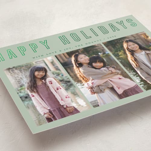 This is a elf shoes foil pressed holiday cards with foil pressed by Juliana Zimmermann called triple happiness printing on recycled smooth signature in standard