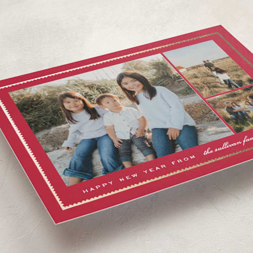 This is a poinsettia foil pressed holiday cards with foil pressed by Amy Kross called sealed printing on recycled smooth signature in standard