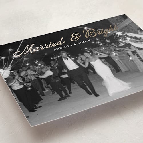 This is a snow foil pressed holiday cards with foil pressed by Annie Holmquist called married and bright printing on recycled smooth signature in standard