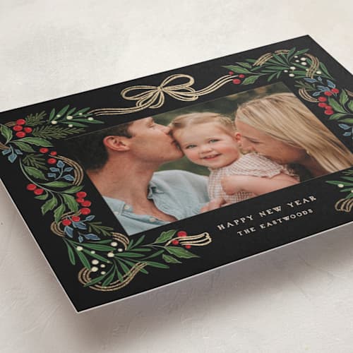 This is a orchard foil pressed holiday cards with foil pressed by Grae called sparkly holiday ribbon printing on recycled smooth signature in standard