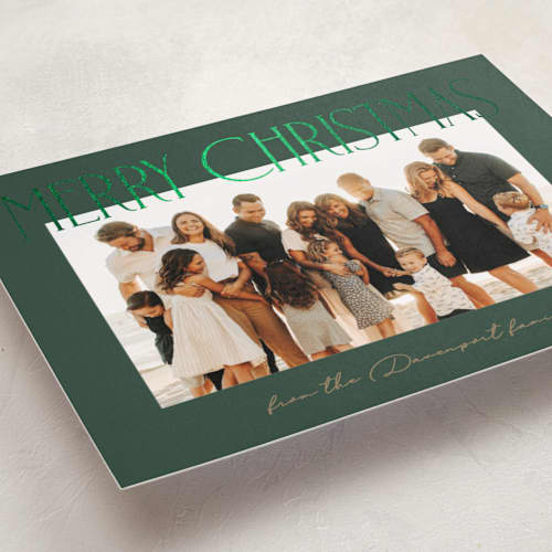 This is a evergreen foil pressed holiday cards with foil pressed by Kacey Kendrick Wagner called christmas headline printing on recycled smooth signature in standard