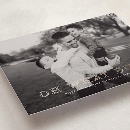 This is a snow foil pressed holiday cards with foil pressed by Up Up Creative called exclaim printing on recycled smooth signature in standard