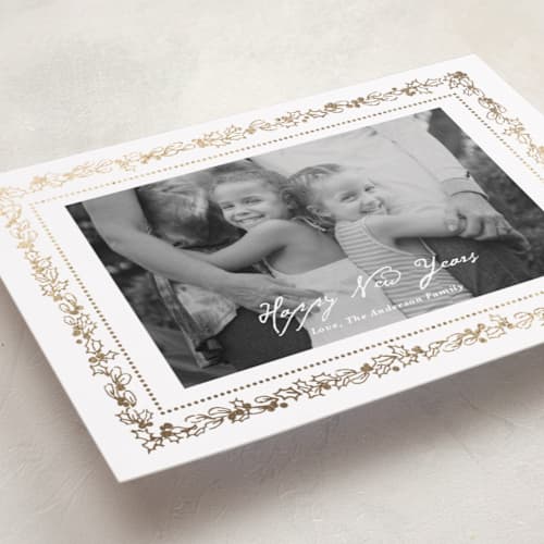 This is a snow foil pressed holiday cards with foil pressed by Cass Loh called gilded botanical frame printing on recycled smooth signature in standard
