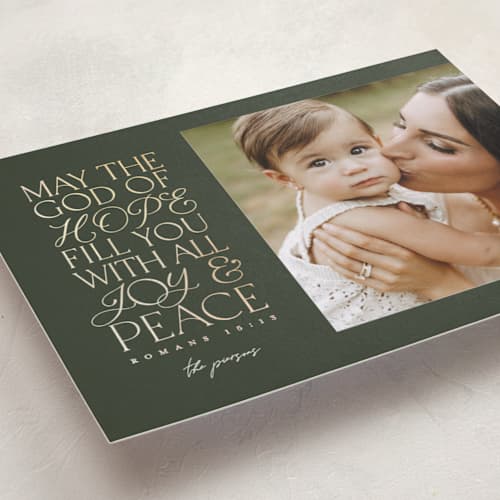 This is a fir foil pressed holiday cards with foil pressed by Pink House Press called filled with love printing on recycled smooth signature in standard