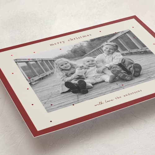 This is a poinsettia foil pressed holiday cards with foil pressed by Kelly Watkins called holiday sparkle printing on recycled smooth signature in standard
