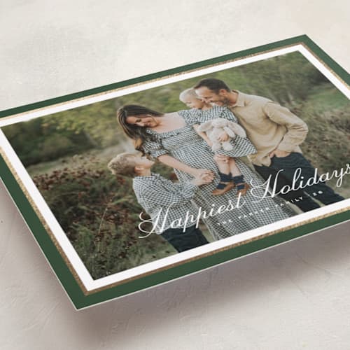 This is a forest foil pressed holiday cards with foil pressed by Kelly Schmidt called minimal border printing on recycled smooth signature in standard