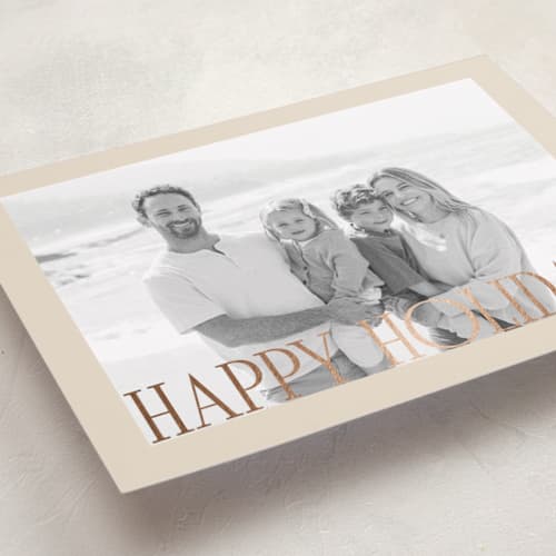 This is a ecru foil pressed holiday cards with foil pressed by Angela Thompson called happy holiday portrait printing on recycled smooth signature in standard
