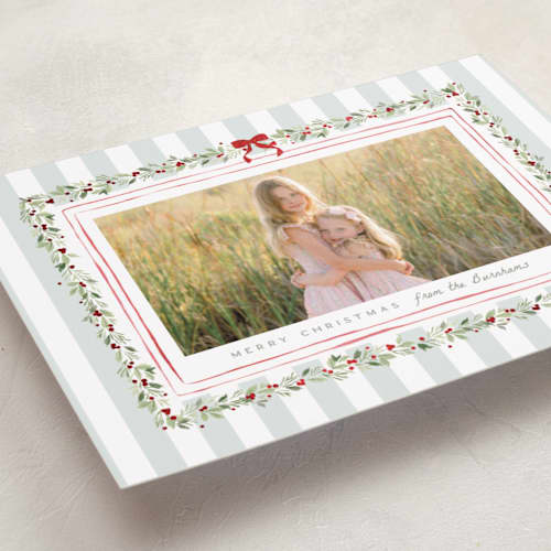 This is a winter mint foil pressed holiday cards with foil pressed by Everett Paper Goods called coastal garland printing on recycled smooth signature in standard