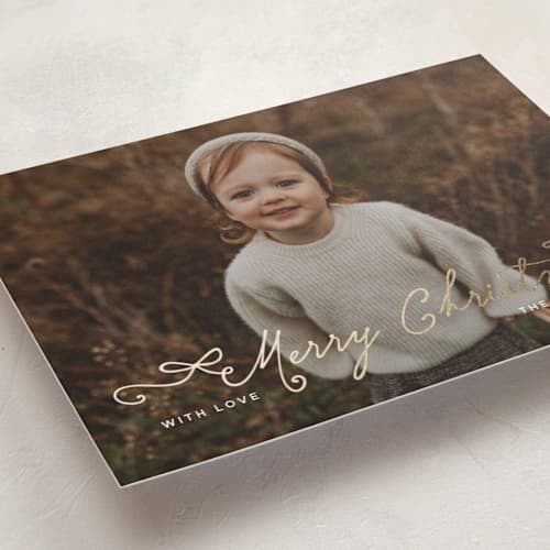 This is a marshmallow foil pressed holiday cards with foil pressed by Heather Schertzer called darling printing on recycled smooth signature in standard