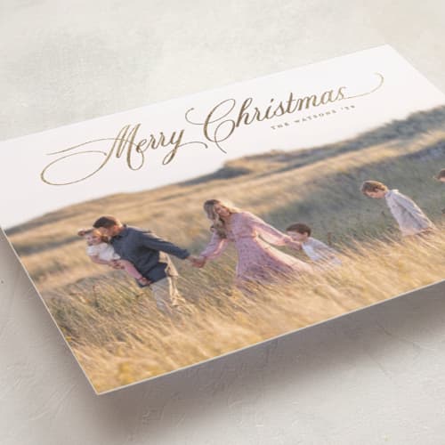 This is a sand foil pressed holiday cards with foil pressed by Christy Hy Lee called classically printing on recycled smooth signature in standard