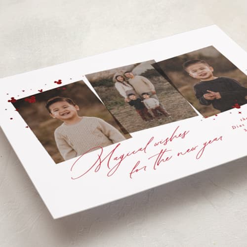 This is a scarlet foil pressed holiday cards with foil pressed by Lea Delaveris called merry moments magical memories printing on recycled smooth signature in standard