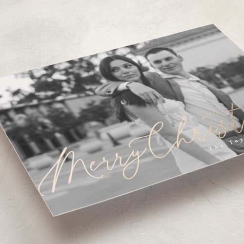 This is a snow foil pressed holiday cards with foil pressed by Julie Ley called beautiful foil script printing on recycled smooth signature in standard