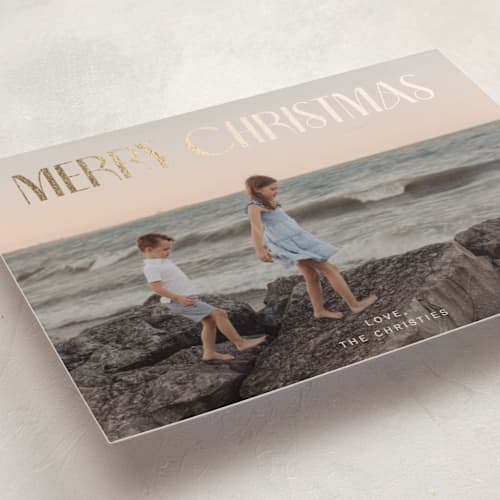 This is a cream foil pressed holiday cards with foil pressed by Ani Somi called sous le soleil printing on recycled smooth signature in standard