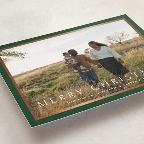 This is a pine foil pressed holiday cards with foil pressed by Amy Kross called winds printing on recycled smooth signature in standard