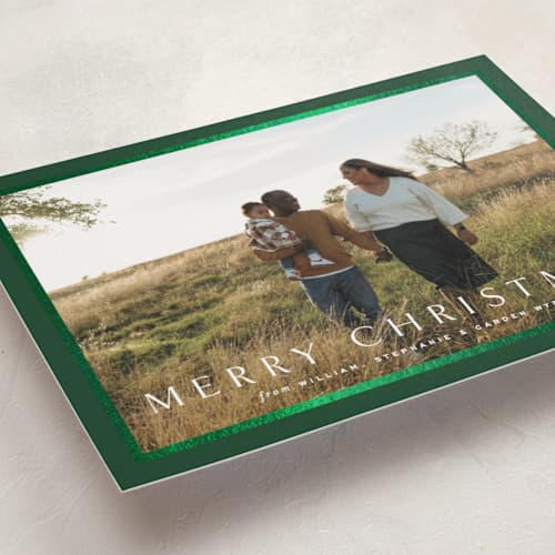 This is a pine foil pressed holiday cards with foil pressed by Amy Kross called winds printing on recycled smooth signature in standard