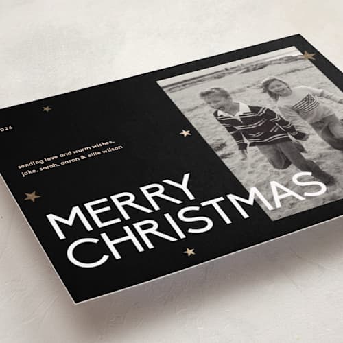 This is a coal foil pressed holiday cards with foil pressed by Owl and Toad called sparkles printing on recycled smooth signature in standard