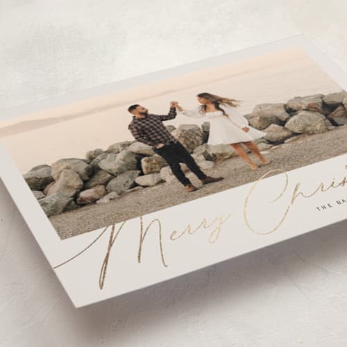 This is a eggnog foil pressed holiday cards with foil pressed by Melanie Severin called simply charming printing on recycled smooth signature in standard