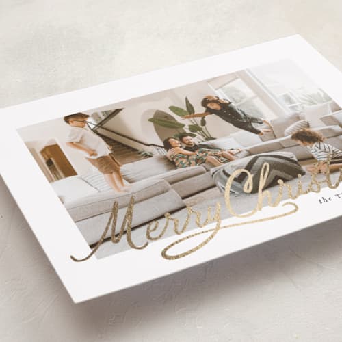 This is a snowdrift foil pressed holiday cards with foil pressed by Karidy Walker called classic christmas script printing on recycled smooth signature in standard