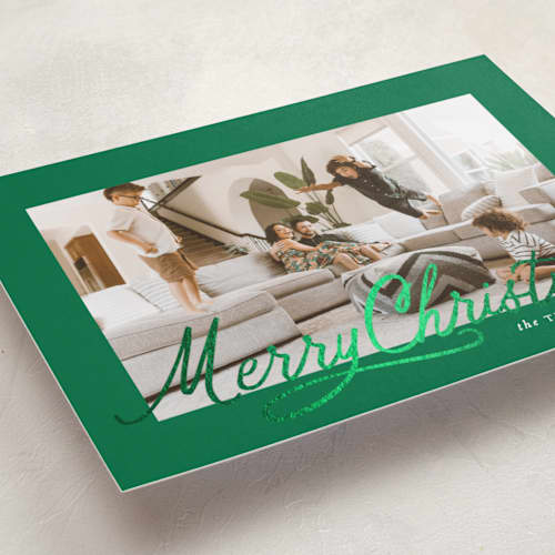 This is a emerald foil pressed holiday cards with foil pressed by Karidy Walker called classic christmas script printing on recycled smooth signature in standard