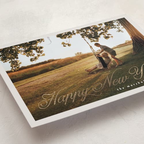 This is a marshmallow foil pressed holiday cards with foil pressed by Pati Cascino called noelle printing on recycled smooth signature in standard