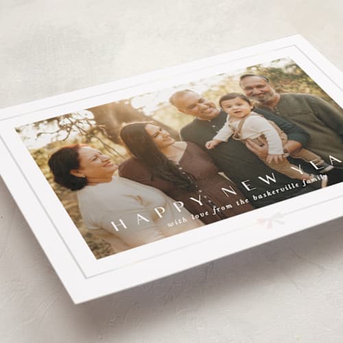 This is a snow gloss press holiday cards with gloss press by Lori Wemple called pretty bow printing on recycled smooth signature in standard