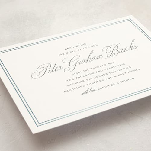 This is a cement foil stamped birth announcements with foil pressed by Megan Davis called scholarly charm printing on signature in standard