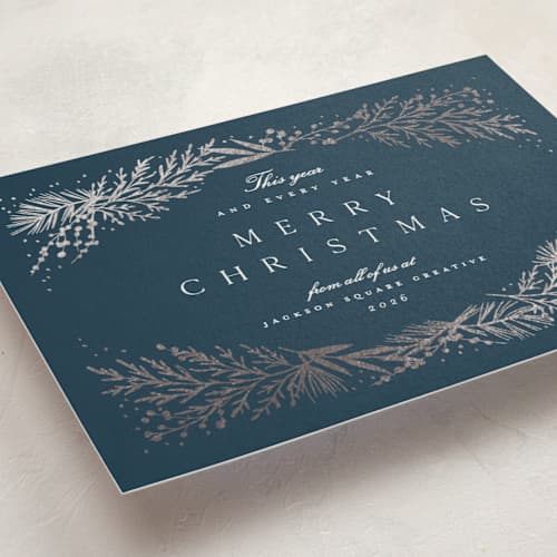 This is a juniper business holiday cards with foil pressed by Amy Kross called spread cedars printing on signature in standard