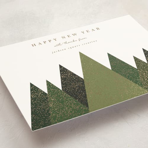 This is a fir business holiday cards with foil pressed by Roopali called shimmering christmas trees printing on signature in standard