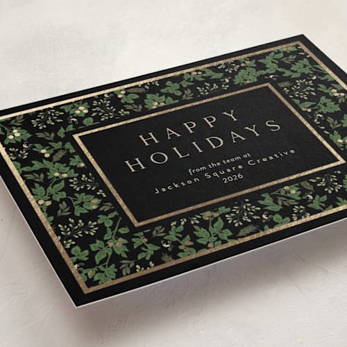 This is a pine business holiday cards with foil pressed by Susan Moyal called happy holiday printing on signature in standard