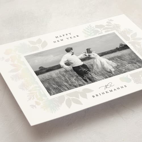 This is a snow gloss press holiday cards with gloss press by Brooke Chandler called joy greenery printing on signature in standard